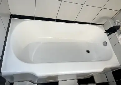 Freshly reglazed bathtub with a clean, spotless white coating