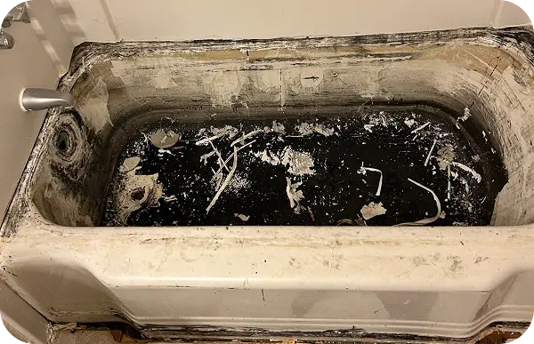 Repaired bathtub chip with smooth finish