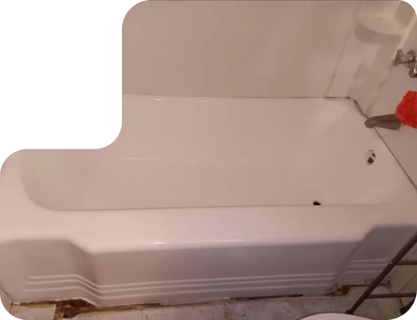 Clean white bathtub with glossy surface in modern bathroom